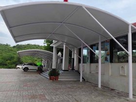 Curved Car Parking Tensile Structure PVC Membrane Canopy Manufacturers in Udaipur